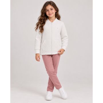 Girl modelling an orchid purple Kidley geometric-textured bomber jacket with full sleeves