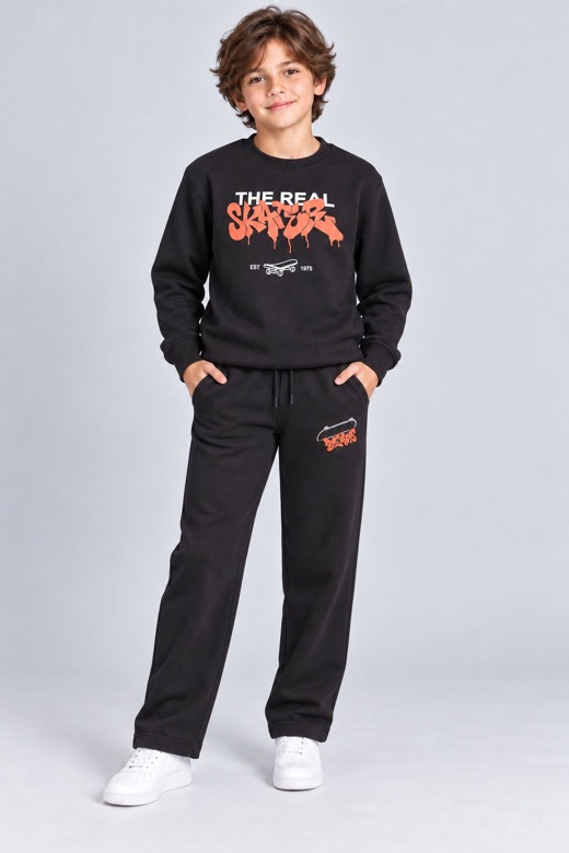 Boy in a black tracksuit